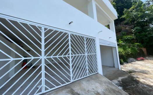 Villa con Vista al Mar de 4 Habitaciones en Coson con Amplias Terrazas